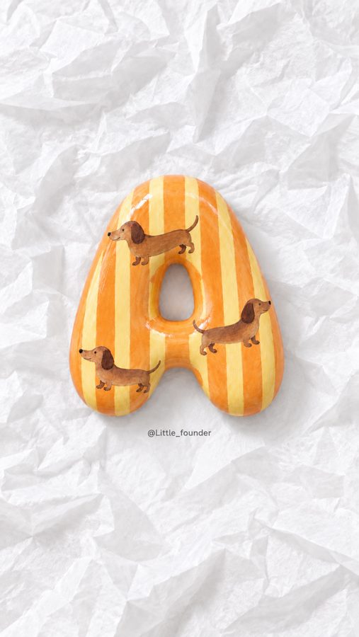 Letter with dachshunds on orange stripes